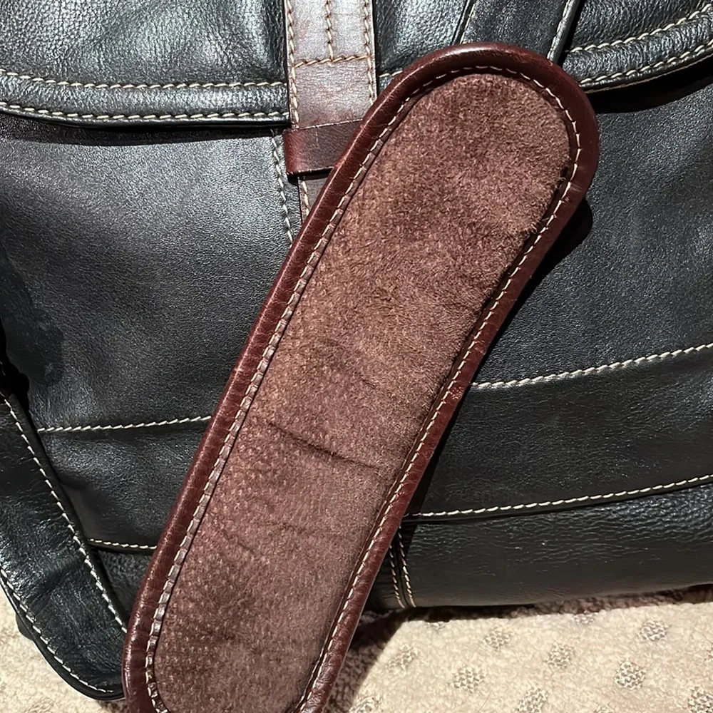 The territory ahead, black with brown leather trim, laptop bag